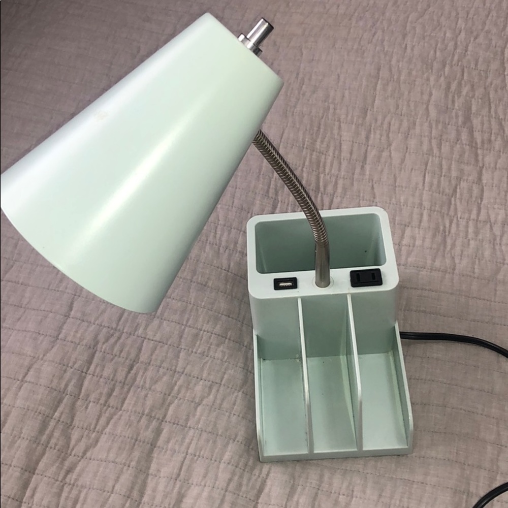 Desk lamp with chargers and storage